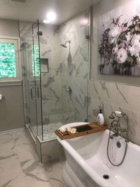 New tile floors, new tile shower walls, new shower glass, new stand alone tub, new fixtures, new paint, new granite counters, new vanity, new toilet.