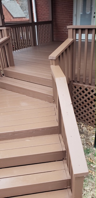 New cedar wood deck repairs with solid stain.