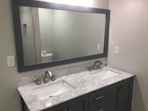 New mirror, vanity, granite, and paint floors.