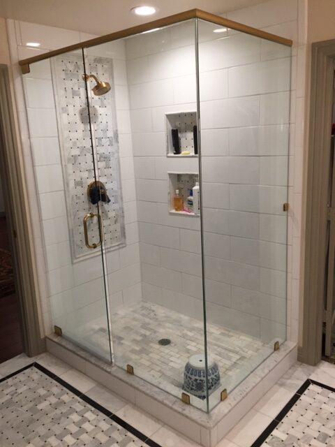 New shower and floor tile, new shower door glass.