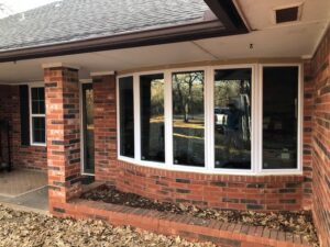 New vinyl low-e single hung windows with picture bay windows.