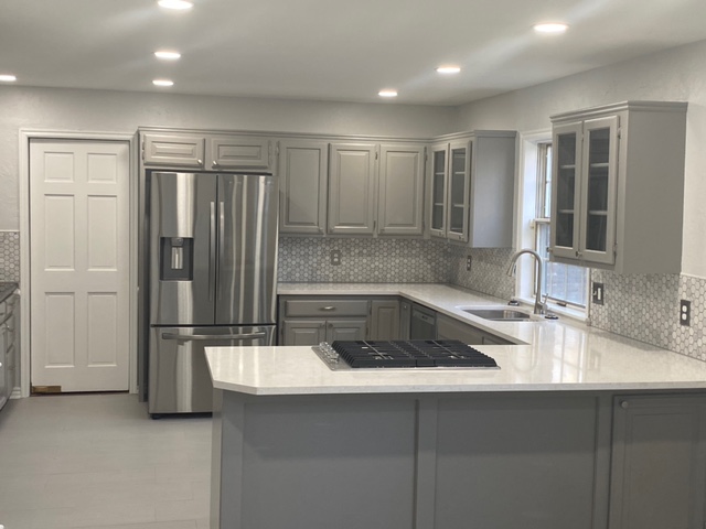 Kitchen with quartz counters - Eisel Roofing