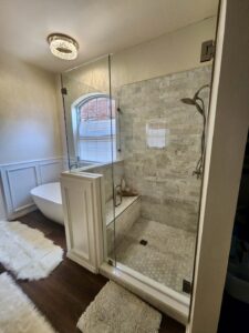 Perfect remodel. Total rebuild of shower with custom tile and wainscot exterior. New stand alone tub. All new paint.