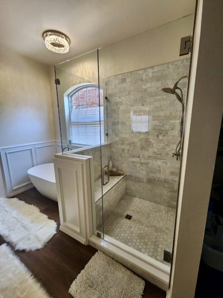 Perfect remodel.  Total rebuild of shower with custom tile and wainscot exterior.  New stand alone tub.   All new paint.
