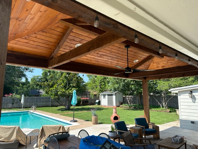 Beautiful patio cover with cedar stain!