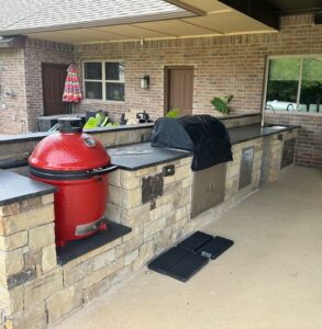 Brand new outdoor kitchen! Built from ground up: stone exterior, granite counters, pad for egg, opening for gas grill, refrigerator, appliance drawers, and sink.