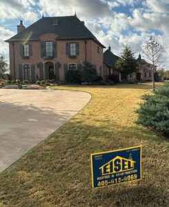 Elegant Deer Creek home with new luxury Grand Manor Class IV shingles, fresh paint, stain, cedar columns, and windows.